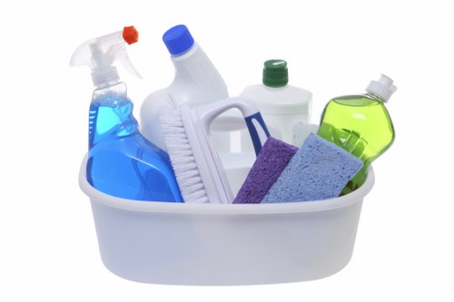 Cleaner preparing equipment while following a safe workplace routine