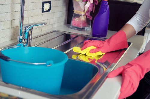 Detailed post-construction cleaning of kitchen surfaces and fittings